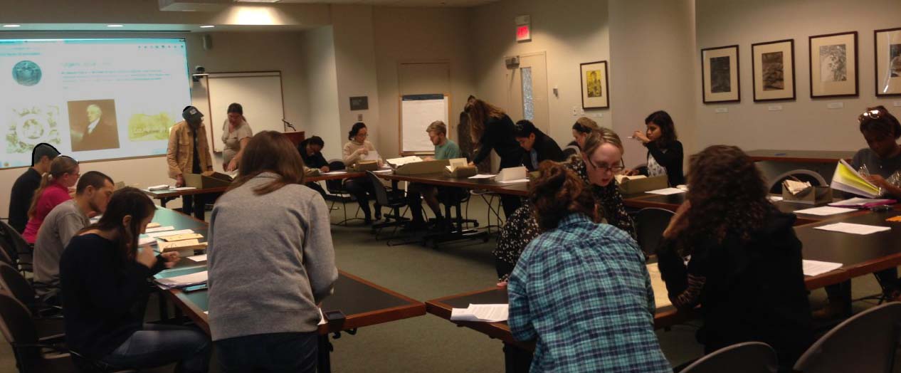 Rutgers students studying rare herbals, cook books and and materials from the Sinclair NJ cookbook collection