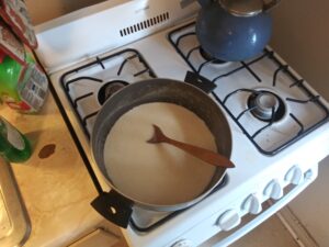 Bowl of cornmeal and milk
